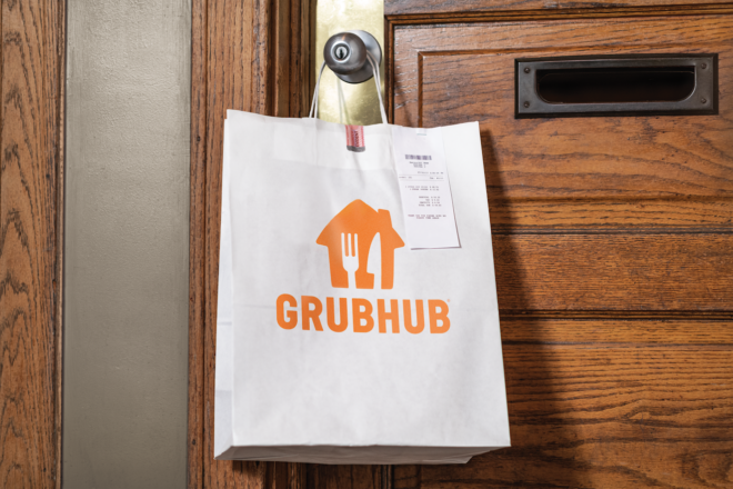 Grubhub bag hanging on door