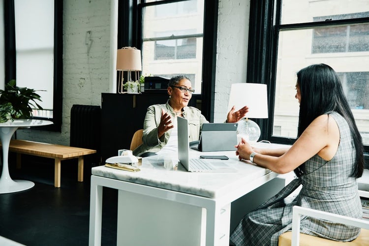 Two women meeting in an office