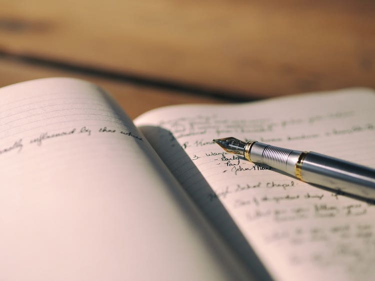 Fountain pen on notebook