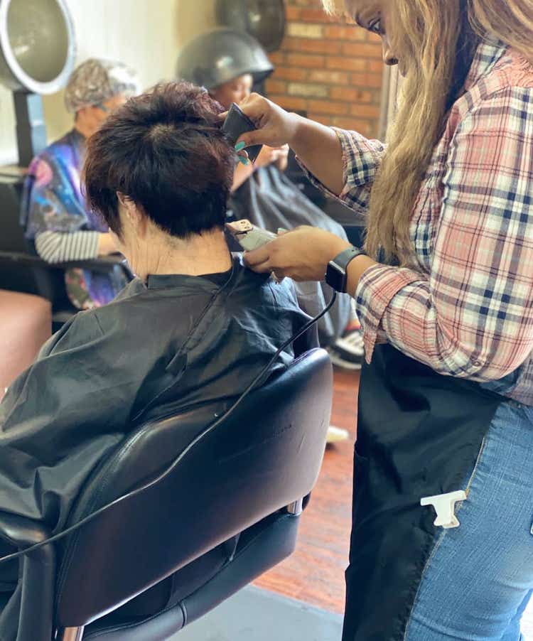 Woman cutting hair