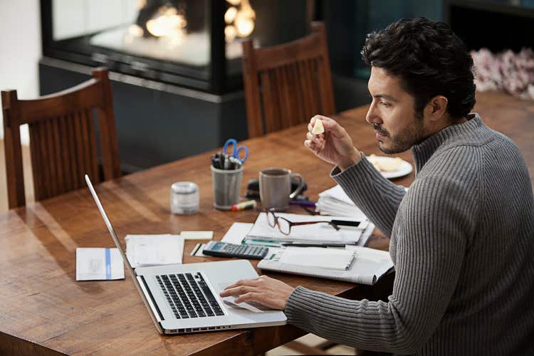 Man paying business bills online