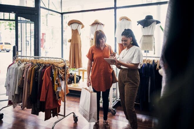 Customer talking with boutique employee