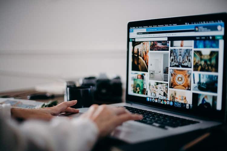 Person looking at online photo gallery