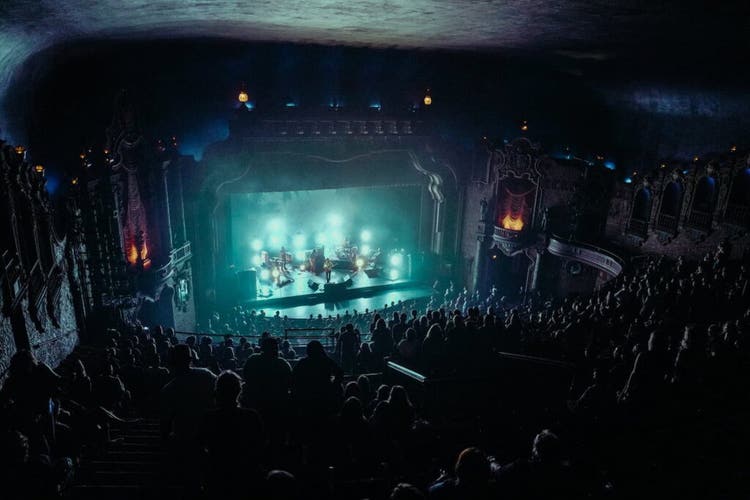 Canton Palace Theatre interior featuring the stage during a concert