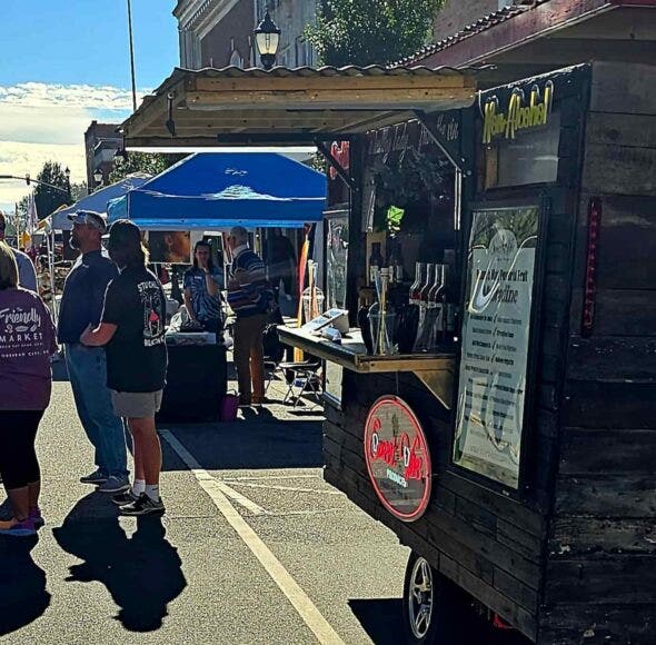 Sweet Vine Products trailer at a street festival