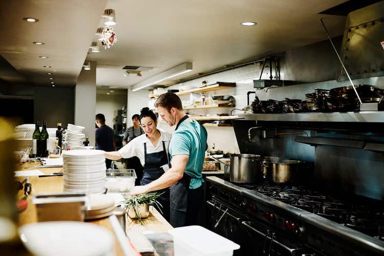 Chefs looking at ingredients