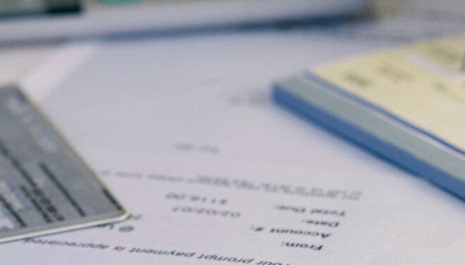 Credit card and checkbook