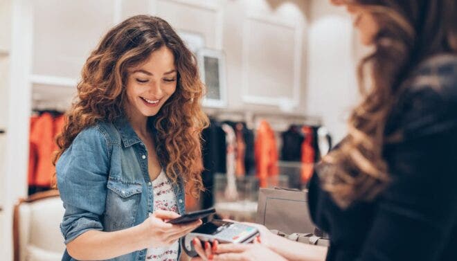 Woman making mobile payment