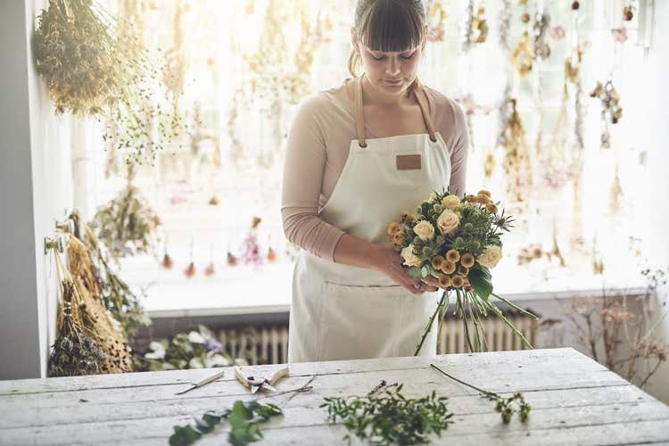 Florist arranging a bouquet