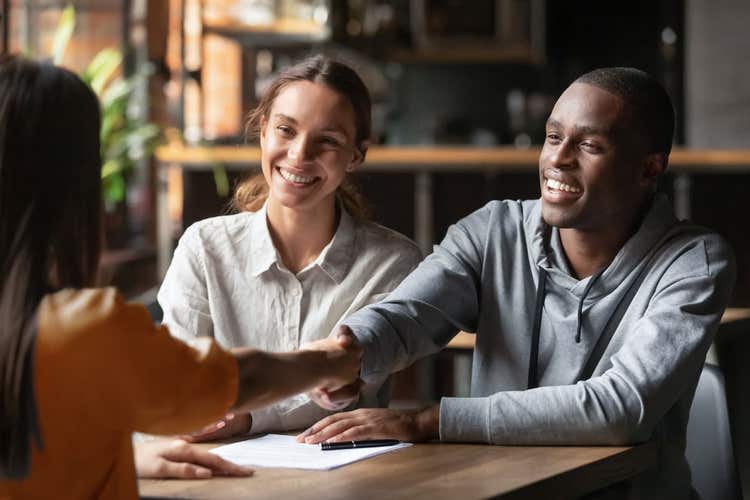 Three people at job interview at restaurant