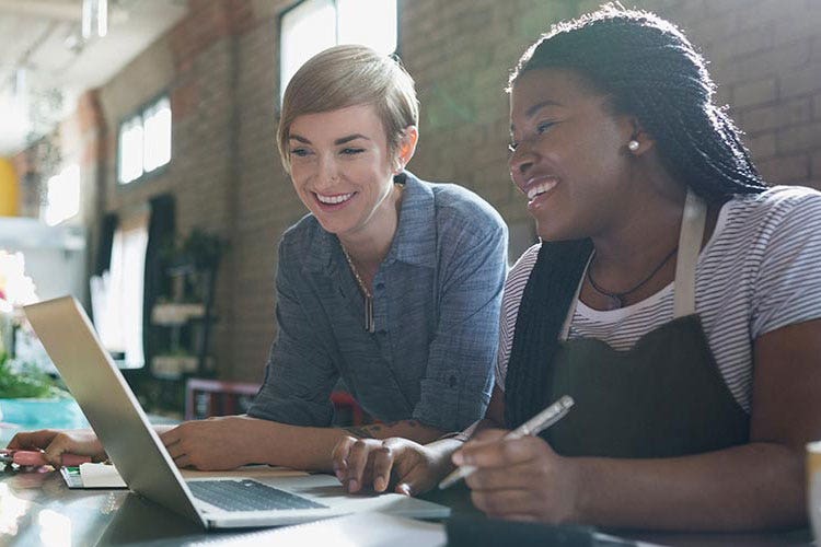 Women looking at laptop