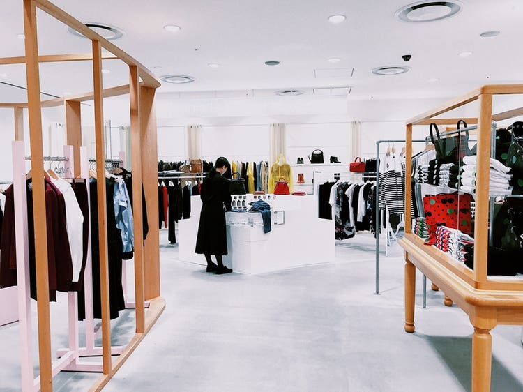 Woman standing in boutique