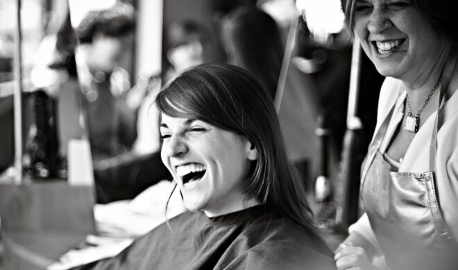 Smiling woman in salon chair