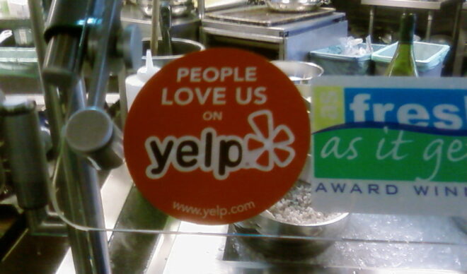 Yelp decal in business window