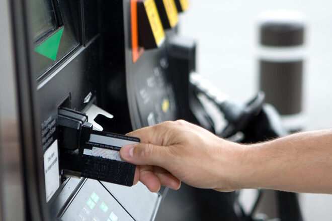 Inserting credit card at gas pump