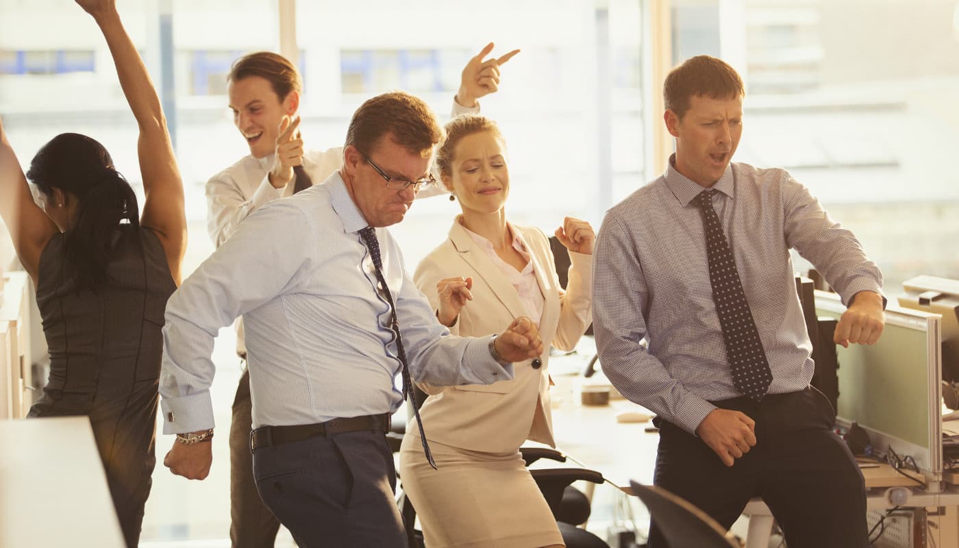 People dancing in the office