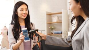 Cashier scanning eGift card on mobile