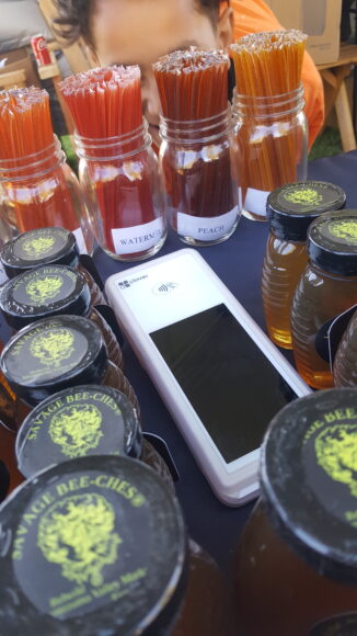 Clover Flex on table with honey jars