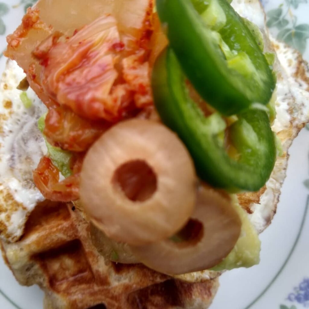 Waffle topped with pineapple and jalapenos