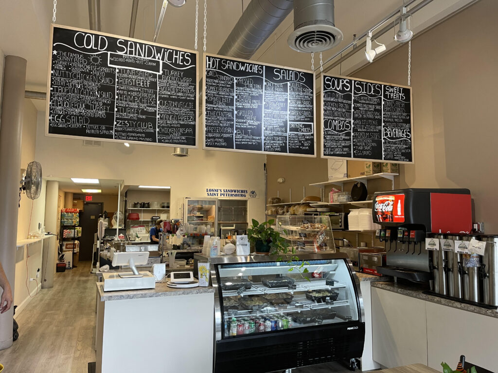 Menu boards and counter at Lonni's Sandwiches