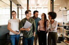 Five millennial employees in an office