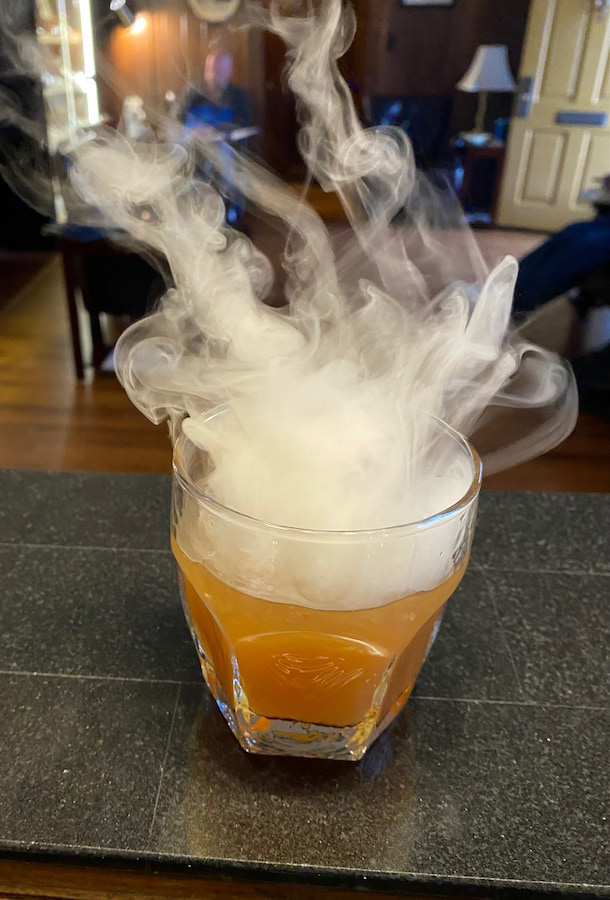 Smoking glass of bourbon