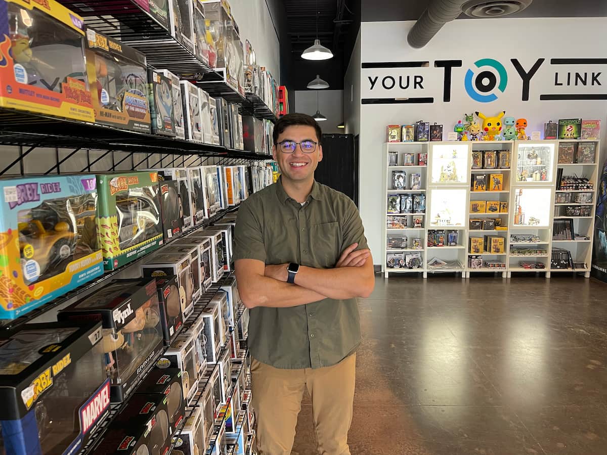 Owner of Your Toy Link in his shop