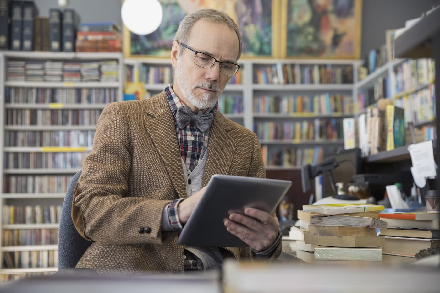 Bookstore owner on tablet