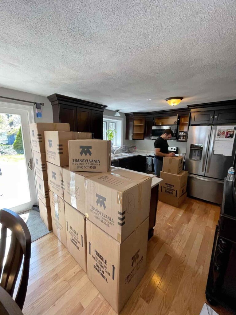 Moving boxes in a customer's kitchen