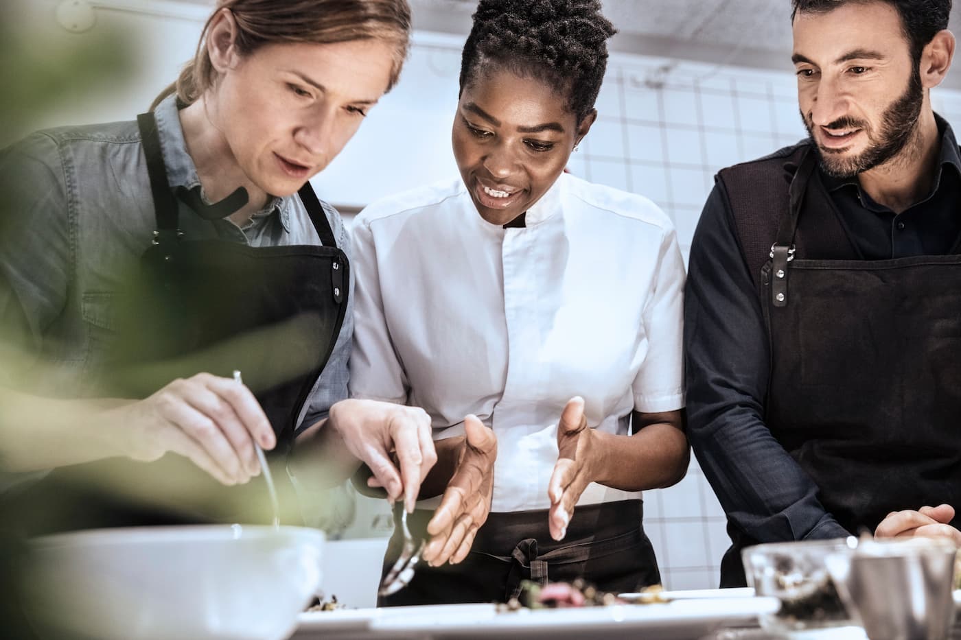 Female chef teaching a cooking class