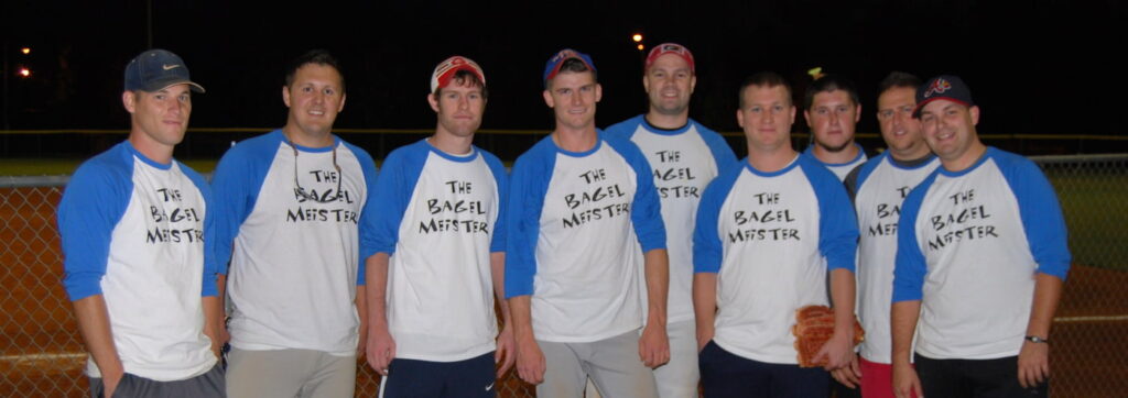 A sports team wearing The Bagel Meister t-shirts