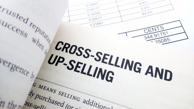 Dictionary with definition of cross-selling and up-selling