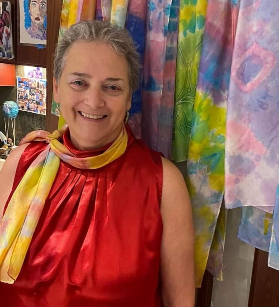 Owner of Art as Therapy with scarves