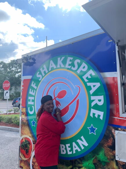 Owner of Chef Shakespeare in front of her food truck