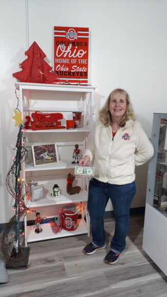 Owner of C&T Assorted Sweets standing in her Ohio shop