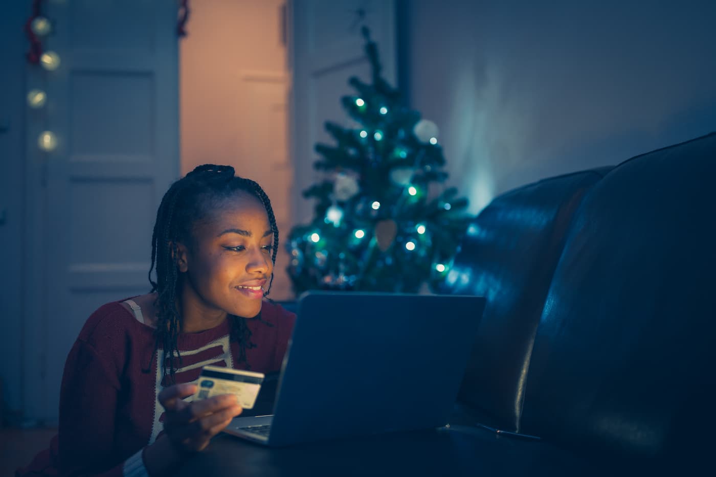 Woman shopping online for holiday gifts