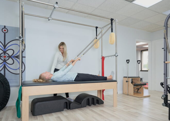 Owner of Actify Physiotherapy and Wellness working with a patient
