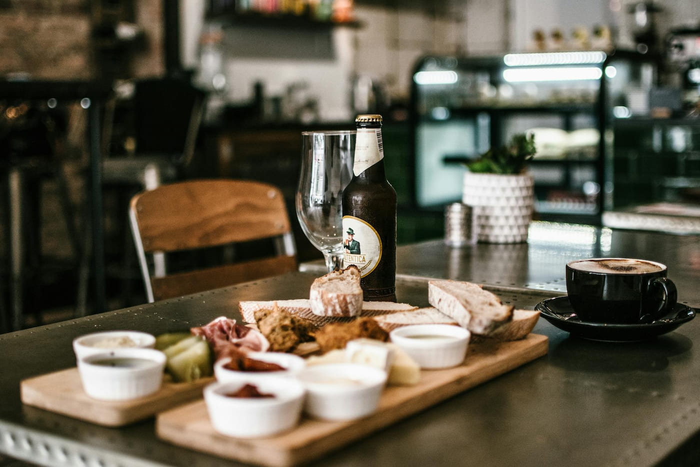 Charcuterie board and drinks sitting on a restaurant table